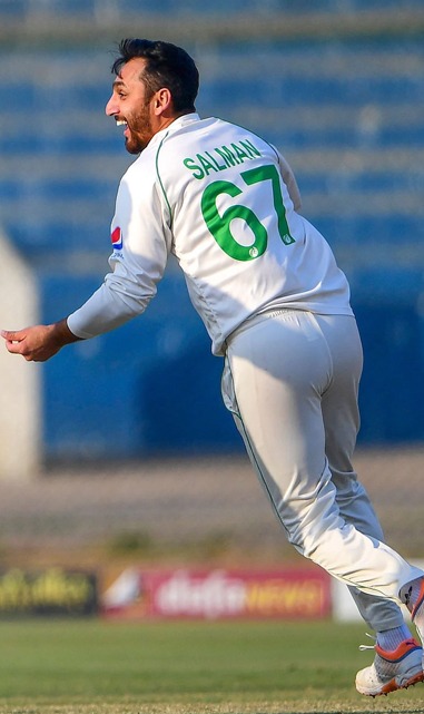 Salman Agha celebrates after taking wicket
